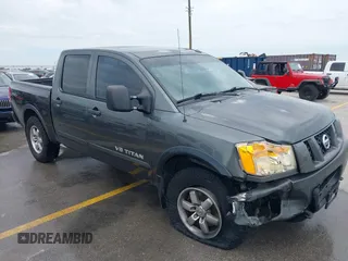 2010 Nissan Titan Pro-4X z VIN 1N6BA0EC9AN323943, wystawiony jako IAAI lot #42795482 z przebiegiem 200 453 mil mil oraz . Historia ofert i sprzedaży dostępna na DreamBid. Obrazek 1.