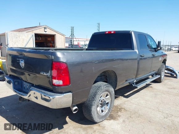 2018 Ram 2500 Tradesman z VIN 3C6UR5HL8JG283609, wystawiony jako IAAI lot #42491762 z przebiegiem 139 492 mil mil oraz . Historia ofert i sprzedaży dostępna na DreamBid. Obrazek 4.