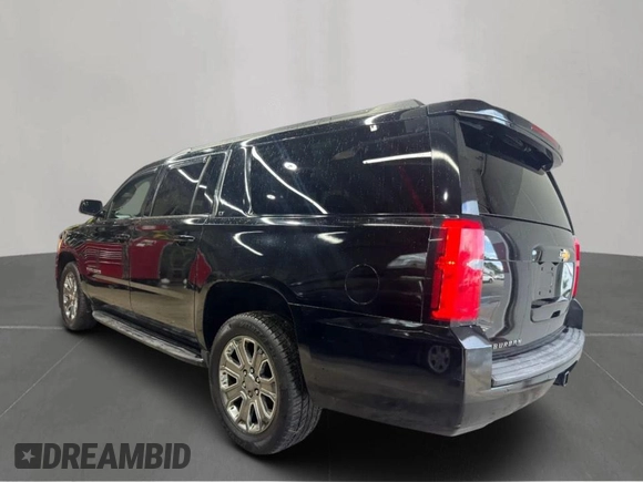 2015 Chevrolet Suburban LT with VIN 1GNSKJKC6FR60382, listed as a Copart auction lot 63533635 with 216,142 mi miles and Clean title. Bid and sale history available at DreamBid. Image 3.