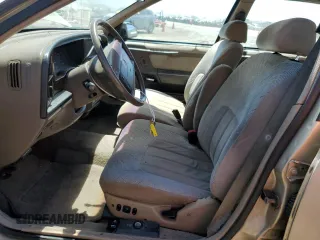 1990 Mercury Sable z VIN 1MECM50U6LG650642, wystawiony jako Copart lot #68279364 z przebiegiem 77 204 mil mil oraz Tytuł czysty. Historia ofert i sprzedaży dostępna na DreamBid. Obrazek 7.