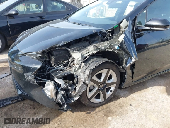 2017 Toyota Prius Two with VIN JTDKARFU5H3045014, listed as a IAAI auction lot 42152419 with 69,760 mi miles and . Bid and sale history available at DreamBid. Image 6.