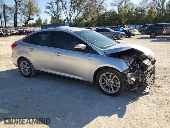 2017 Ford Focus SE with VIN 1FADP3F29HL327312, listed as a Copart auction lot 48533925 with 199,047 mi miles and Salvage Title. Bid and sale history available at carsss.com. Image 4.