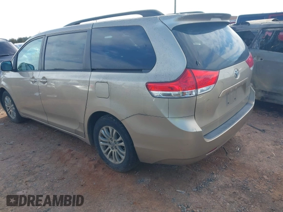 2011 Toyota Sienna XLE AAS with VIN 5TDYK3DCXBS117023, listed as a IAAI auction lot 41581785 with 216,341 mi miles. Bid and sale history available at carsss.com. Image 3.
