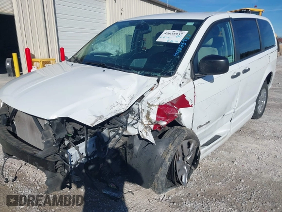 2019 Dodge Grand Caravan SE with VIN 2C7WDGBG7KR803126, listed as a IAAI auction lot 40835937 with 63,100 mi miles and . Bid and sale history available at DreamBid. Image 6.