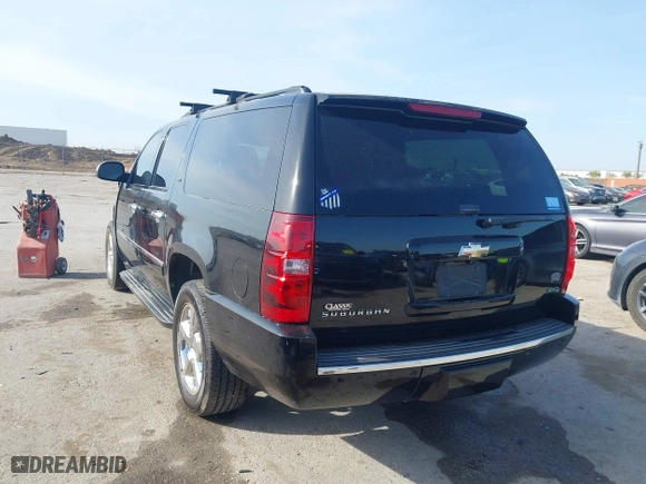 2011 Chevrolet Suburban LTZ with VIN 1GNSCKE03BR117338, listed as a IAAI auction lot 41878479 with 182,327 mi miles. Bid and sale history available at carsss.com. Image 3.