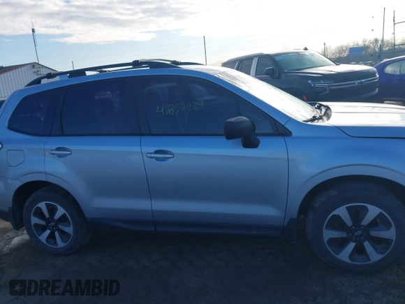 2017 Subaru Forester with VIN JF2SJABC0HH460602, listed as a IAAI auction lot 41856289 with 144,389 mi miles and . Bid and sale history available at DreamBid. Image 13.