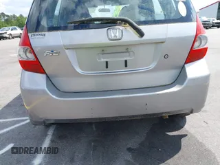 2008 Honda Fit with VIN JHMGD38438S030619, listed as a IAAI auction lot 42010052 with 147,588 mi miles. Bid and sale history available at carsss.com. Image 6.