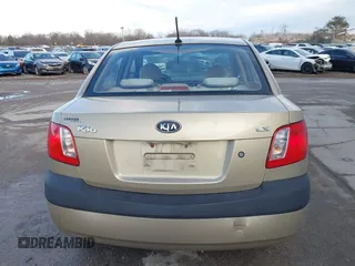 2009 Kia Rio SX with VIN KNADE223196512461, listed as a IAAI auction lot 41520063 with 132,558 mi miles. Bid and sale history available at carsss.com. Image 16.
