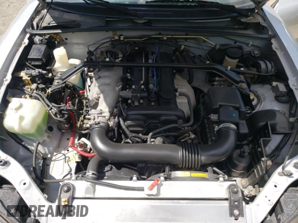 2004 Mazda MX-5 Miata LS with VIN JM1NB353640400140, listed as a Copart auction lot 56127165 with 123,276 mi miles and Salvage title. Bid and sale history available at DreamBid. Image 11.