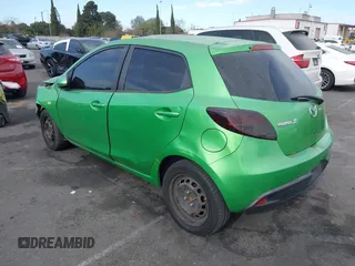 2012 Mazda 2 Sport with VIN JM1DE1KZ4C0140559, listed as a IAAI auction lot 41265959 with 139,364 mi miles and . Bid and sale history available at DreamBid. Image 3.