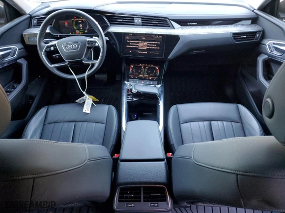 2022 Audi e-tron Premium with VIN WA1AAAGE4NB023022, listed as a Copart auction lot 76661104 with 25,465 mi miles and Salvage Title. Bid and sale history available at carsss.com. Image 8.