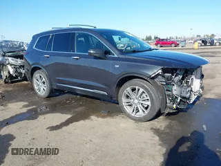 2022 Cadillac XT6 Premium Luxury with VIN 1GYKPFRS7NZ173703, listed as a IAAI auction lot 41335618 with 32,116 mi miles. Bid and sale history available at carsss.com. Image 1.