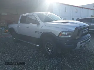 2017 Ram 1500 Rebel z VIN 1C6RR7YT2HS681533, wystawiony jako IAAI lot #41559307 z przebiegiem 145 150 mil mil oraz . Historia ofert i sprzedaży dostępna na DreamBid. Obrazek 1.