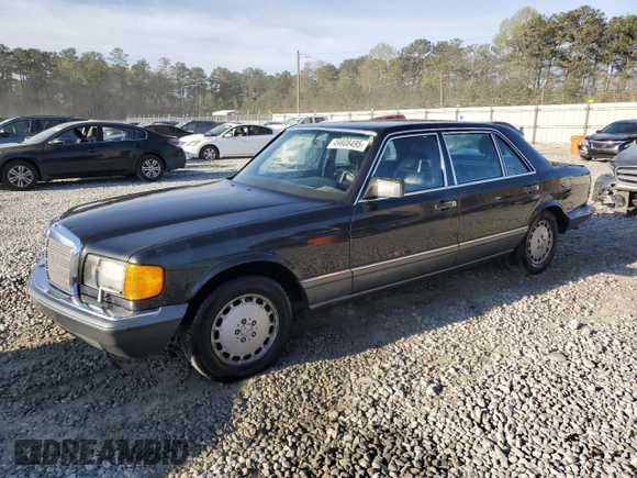 1989 Mercedes-Benz 560 with VIN WDBCA39E9KA463003, listed as a Copart auction lot 49808495 with 125,388 mi miles and Salvage Title. Bid and sale history available at DreamBid. Image 1.