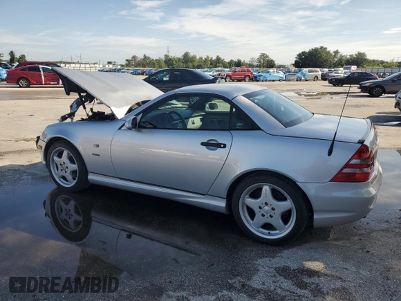 2000 Mercedes-Benz SLK-Class Kompressor with VIN WDBKK47F6YF164963, listed as a Copart auction lot 68790614 with 102,997 mi miles and Salvage Title. Bid and sale history available at carsss.com. Image 2.