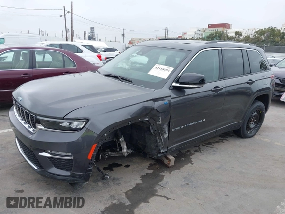 2022 Jeep Grand Cherokee with VIN 1C4RJYB68N8748802, listed as a IAAI auction lot 42158104 with 28,227 mi miles and . Bid and sale history available at DreamBid. Image 2.
