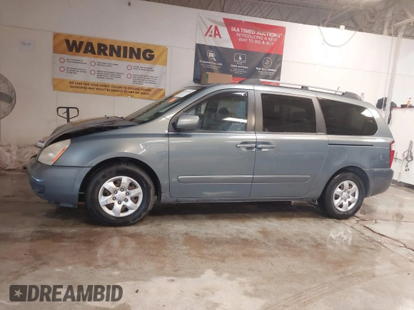 2009 Kia Sedona LX with VIN KNDMB233X96276905, listed as a IAAI auction lot 41394768 with 231,156 mi miles. Bid and sale history available at carsss.com. Image 15.