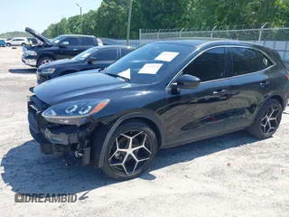 2021 Ford Escape SE z VIN 1FMCU0G66MUB26983, wystawiony jako IAAI lot #42144053 z przebiegiem 60 614 mil mil oraz . Historia ofert i sprzedaży dostępna na DreamBid. Obrazek 2.