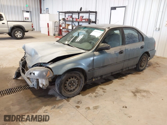 1998 Honda Civic DX with VIN JHMEJ6622WS000401, listed as a IAAI auction lot 41588057 with 296,638 mi miles. Bid and sale history available at carsss.com. Image 2.