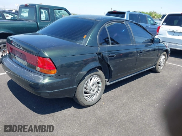 1999 Saturn SL с VIN 1G8ZK5274XZ304652, выставлен на аукционе IAAI как лот 42618620 с пробегом 98 131 миль миль и . История ставок и продаж доступна на DreamBid. Изображение 4.