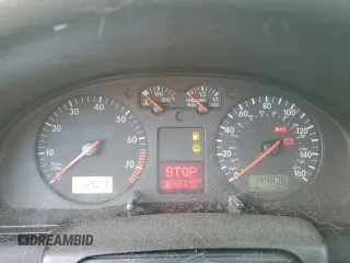 2000 Volkswagen Passat z VIN WVWRH23B6YE274455, wystawiony jako Copart lot #81634704 z przebiegiem 154 076 mil mil oraz Czysty tytuł • Clean title. Historia ofert i sprzedaży dostępna na DreamBid. Obrazek 9.