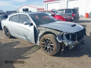 2019 Dodge Charger Scat Pack with VIN 2C3CDXGJXKH599632, listed as a IAAI auction lot 41666680 with 116,995 mi miles and . Bid and sale history available at DreamBid. Image 1.