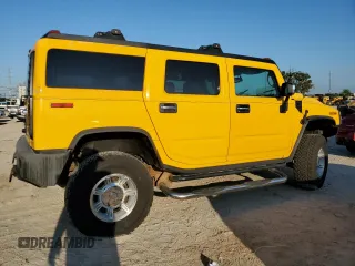 2003 Hummer H2 with VIN 5GRGN23U23H145779, listed as a Copart auction lot 72048564 with 268,329 mi miles and Clean Title. Bid and sale history available at carsss.com. Image 3.