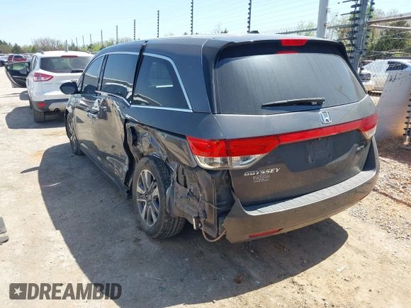 2015 Honda Odyssey Touring Elite with VIN 5FNRL5H98FB034700, listed as a IAAI auction lot 42019265 with 226,829 mi miles and . Bid and sale history available at DreamBid. Image 3.