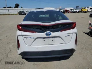2021 Toyota Prius LE z VIN JTDKAMFP7M3191079, wystawiony jako Copart lot #57529195 z przebiegiem 52 809 mil mil oraz Szkoda całkowita • Salvage title. Historia ofert i sprzedaży dostępna na DreamBid. Obrazek 6.