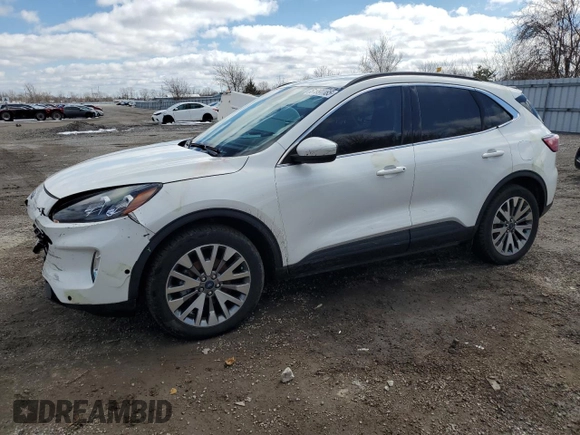 2021 Ford Escape Titanium Hybrid с VIN 1FMCU9DZ5MUA23637, выставлен на аукционе Copart как лот 51991185 с пробегом 101 012 миль миль и Чистый • Clean title. История ставок и продаж доступна на DreamBid. Изображение 1.