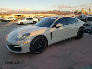 2021 Porsche Panamera с VIN WP0AJ2A73ML117455, выставлен на аукционе Copart как лот 76828823 с пробегом 54 543 миль миль и . История ставок и продаж доступна на DreamBid. Изображение 1.