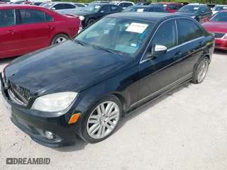 2009 Mercedes-Benz C-Class 3.0L Sport with VIN WDDGF81X59R057137, listed as a IAAI auction lot 41929478 with 157,153 mi miles. Bid and sale history available at carsss.com. Image 2.