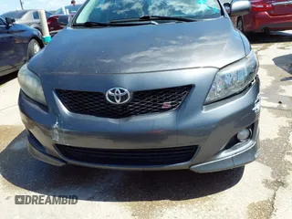 2010 Toyota Corolla with VIN 2T1BU4EEXAC463697, listed as a IAAI auction lot 42099807 with 206,160 mi miles. Bid and sale history available at carsss.com. Image 6.