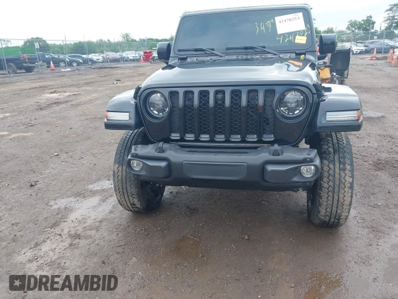 2023 Jeep Gladiator Overland with VIN 1C6JJTFM9PL593659, listed as a IAAI auction lot 42470253 with 34,374 mi miles and . Bid and sale history available at DreamBid. Image 6.