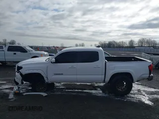 2019 Toyota Tacoma SR z VIN 3TMCZ5AN9KM284092, wystawiony jako IAAI lot #41774851 z przebiegiem 100 031 mil mil oraz . Historia ofert i sprzedaży dostępna na DreamBid. Obrazek 14.