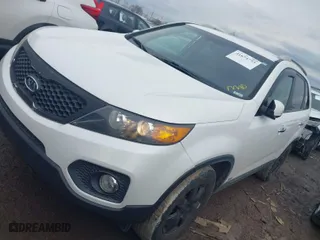 2012 Kia Sorento LX with VIN 5XYKTCA67CG308138, listed as a IAAI auction lot 41674753 with 162,367 mi miles. Bid and sale history available at carsss.com. Image 2.