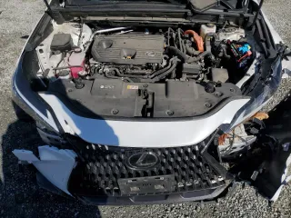 2022 Lexus NX 350h Premium z VIN 2T2GKCEZ7NC004590, wystawiony jako Copart lot #47882885 z przebiegiem 20 339 mil mil oraz Szkoda całkowita • Salvage title. Historia ofert i sprzedaży dostępna na DreamBid. Obrazek 14.