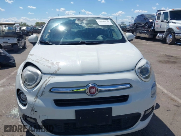 2016 FIAT 500X Lounge z VIN ZFBCFXDT0GP333273, wystawiony jako IAAI lot #42269130 z przebiegiem 98 707 mil mil oraz . Historia ofert i sprzedaży dostępna na DreamBid. Obrazek 12.
