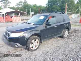 2009 Subaru Forester X with VIN JF2SH63619H772625, listed as a IAAI auction lot 42381409 with 169,174 mi miles and . Bid and sale history available at DreamBid. Image 2.
