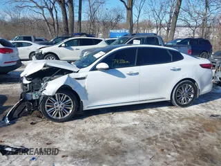 2016 Kia Optima SXL Turbo with VIN 5XXGV4L23GG073151, listed as a IAAI auction lot 41363341 with 74,226 mi miles. Bid and sale history available at carsss.com. Image 14.