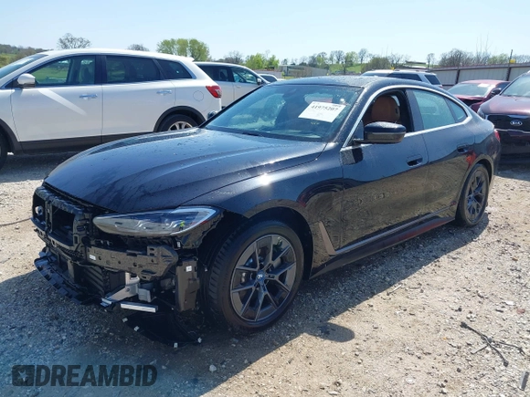 2024 BMW i4 xDrive40 z VIN WBY83FB05RFS37070, wystawiony jako IAAI lot #41975207 z przebiegiem 8 304 mil mil oraz . Historia ofert i sprzedaży dostępna na DreamBid. Obrazek 20.
