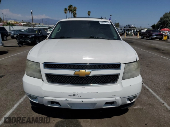2014 Chevrolet Suburban LT with VIN 1GNSKJE79ER112840, listed as a Copart auction lot 64709074 with Not Provided miles and Salvage Title. Bid and sale history available at DreamBid. Image 5.