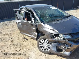2017 Honda Fit LX with VIN JHMGK5H58HS022560, listed as a IAAI auction lot 40710663 with 86,228 mi miles and . Bid and sale history available at DreamBid. Image 6.