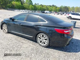 2012 Hyundai Azera with VIN KMHFG4JG1CA185369, listed as a IAAI auction lot 42031314 with 143,461 mi miles and . Bid and sale history available at DreamBid. Image 3.