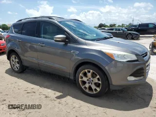2013 Ford Escape SEL with VIN 1FMCU0HX2DUB77937, listed as a Copart auction lot 55948845 with 137,000 mi miles and Clean Title. Bid and sale history available at DreamBid. Image 4.