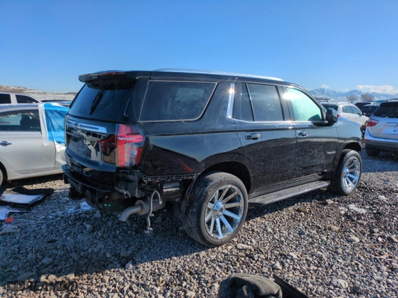 2024 Chevrolet Tahoe High Country with VIN 1GNSKTKT7RR106229, listed as a Copart auction lot 49315525 with 29,668 mi miles and Salvage Title. Bid and sale history available at carsss.com. Image 3.