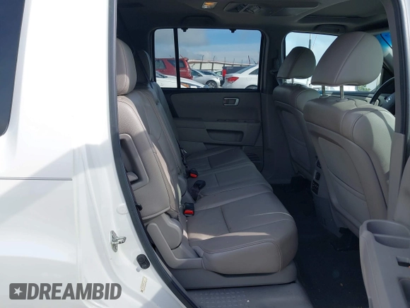 2013 Honda Pilot Touring z VIN 5FNYF4H99DB017351, wystawiony jako IAAI lot #42355167 z przebiegiem 122 191 mil mil oraz . Historia ofert i sprzedaży dostępna na DreamBid. Obrazek 8.
