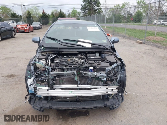 2020 Toyota Corolla SE with VIN 5YFS4RCE5LP056583, listed as a IAAI auction lot 42063358 with 58,027 mi miles and . Bid and sale history available at DreamBid. Image 12.