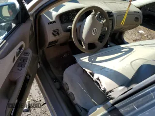 2000 Mazda Protege DX z VIN JM1BJ2220Y0197585, wystawiony jako Copart lot #65309404 z przebiegiem Nie podano mil oraz Nie do naprawy • Non repairable. Historia ofert i sprzedaży dostępna na DreamBid. Obrazek 8.