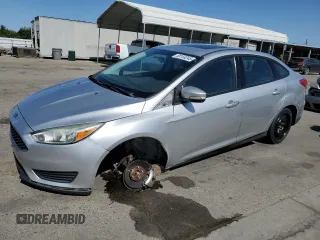 2016 Ford Focus SE z VIN 1FADP3F25GL348592, wystawiony jako Copart lot #58159245 z przebiegiem 78 894 mil mil oraz Szkoda całkowita • Salvage title. Historia ofert i sprzedaży dostępna na DreamBid. Obrazek 1.
